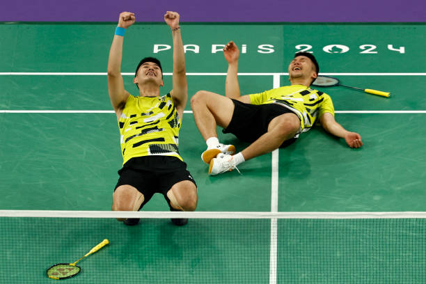 新加坡羽毛球男单选手风采:赛场英姿与生活照大放送